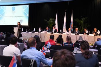 Ouverture 9e Forum et 5e Assemblée des Athlètes Européens HD - Photo caption:  H. E. Ms. Yvette Lambin-Berti, Secretary General of the Monegasque Olympic Committee, at the opening of the 9th Forum and 5th Assembly of European Athletes, in front of the delegatesPhoto credit:  © Manuel Vitali/Government Communication Department