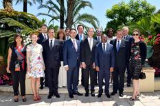 Voir la photo - Front row: Ms Anne-Marie Boisbouvier, Advisor in H.S.H. the Sovereign Prince's Cabinet, H.E. Mr Louis Sylvestre Radegonde, Ambassador Extraordinary and Plenipotentiary of the Republic of Seychelles, H.E. Mr Favien Enongoue, Ambassador Extraordinary and Plenipotentiary of the Gabonese Republic, Mr Gilles Tonelli, Minister of Foreign Affairs and Cooperation, H.E. Mr Jean Galiev, Ambassador Extraordinary and Plenipotentiary of the Republic of Kazakhstan, H.E. Dr Jorge Ryder Torres-Pereira, Ambassador Extraordinary and Plenipotentiary of Portugal and his wife, Ms Bettina Ragazzoni, Honorary Consul of Portugal.Second row: Mr Jean-François Noaro, Honorary Consul of the Seychelles, Ms Nadège Massoungué, Secretary at the Embassy of the Gabonese Republic, Mr Riccardo Giraudi, Honorary Consul of Gabon, Mr Vladimir Semenikhin, Honorary General Consul of Kazakhstan, Mr Diego Bonaventura, Director of the Monaco Chamber of Commerce, Ms Marie-Catherine Caruso, Director of Diplomatic and Consular Relations, and Mr Yerlan Zeineshev, First Secretary at the Embassy of Kazakhstan.© Government Communication Department – Charly Gallo