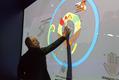 Bertrand Piccard-Pavillon Monaco-Astana 2017 - Dr. Bertrand Piccard, devant l’Eco-Lab, le mur intéractif du Pavillon. ©MIE Bertrand Piccard-Pavillon Monaco-Astana 2017 - Dr. Bertrand Piccard, devant l’Eco-Lab, le mur intéractif du Pavillon. ©MIE
