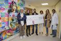 CHPG - Remise chèque Pink Ribbon Monaco. ©Direction de la Communication-Manuel Vitali - De gauche à droite : Anthony Alberti, Benoîte Rousseau de Sevelinges, Directeur du CHPG, Noah Whyle (alias Dr Carter dans la série « Urgences » et frère de Natasha), Céline Cottalorda, Conseiller Technique et Déléguée interministérielle pour la promotion et la protection des droits des femmes, Natasha Frost-Savio, Présidente de Pink Ribbon Monaco et le Dr Georges Garnier, Chef de service Hôpital de Jour. ©Direction de la Communication – Manuel Vitali CHPG - Remise chèque Pink Ribbon Monaco. ©Direction de la Communication-Manuel Vitali - De gauche à droite : Anthony Alberti, Benoîte Rousseau de Sevelinges, Directeur du CHPG, Noah Whyle (alias Dr Carter dans la série « Urgences » et frère de Natasha), Céline Cottalorda, Conseiller Technique et Déléguée interministérielle pour la promotion et la protection des droits des femmes, Natasha Frost-Savio, Présidente de Pink Ribbon Monaco et le Dr Georges Garnier, Chef de service Hôpital de Jour. ©Direction de la Communication – Manuel Vitali