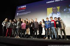 Le Temps presse 2019 - "Debout Kinshasa" reçoit le Prix des Enfants du Festival Le Temps Presse. Au centre, les deux élèves de l'Ecole de Fontvielle, Léna et Mathéa. © LETEMPSPRESSE/SUSYLAGRANGE