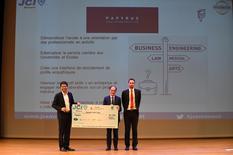 Photo2 - Concours JCE © Manuel Vitali - Direction de la Communication - Jean Castellini presents a cheque to Robert Boisbouvier (on the left), winner of the competition and founder of PAPYRUS © Manuel Vitali - Government Communication Department