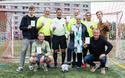 Tournoi de football Jeux inter-fondations CIUP 1 © Antoine Meyssonnier - De gauche à droite : M. Antoine VERRANDO, responsable sport du Comité des résidents de la Fondation de Monaco, M. Guillaume LALLEMENT, responsable football du service des sports de la CIUP (accroupi), Messieurs Stéphane DE LANGRE, Eric AKOUN, Hervé LE GARGASSON, Brahim BOUBKAR, les 4 arbitres officiels de la FFF (en jaune), Mme Martine GARCIA-MASCARENHAS, Directeur de la Fondation de Monaco, M. Bertrand REBOURS, Directeur du service des sports de la CIUP (accroupi), M. Gwendal NOAT, responsable culture du Comité des résidents de la Fondation de Monaco.